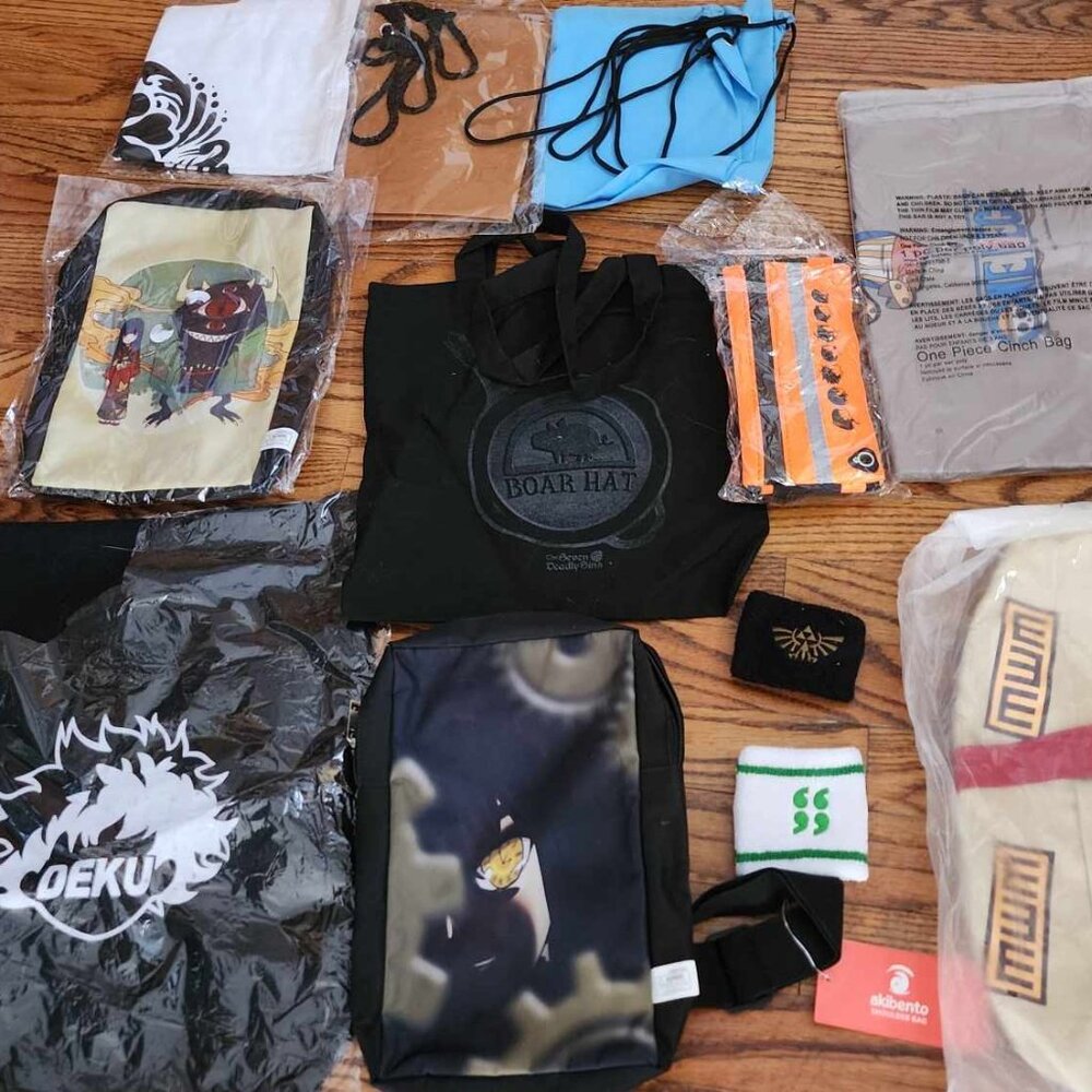 Lot of 10 anime bags & 2 arm wrist bands